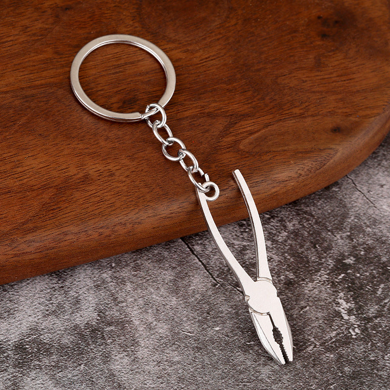 Crafty Keychain Tool Trio: Wrench, Hammer, Screwdriver